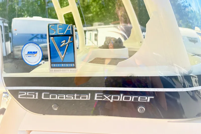 Slide: The Image of 2022 Grady-White 251 Coastal Explorer boat with SEA V2 hull design and NMMA certification. - 19