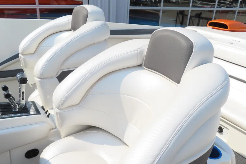 Slide: The Image of Luxury white leather boat seats in a 2003 MTI 42 model. - 10