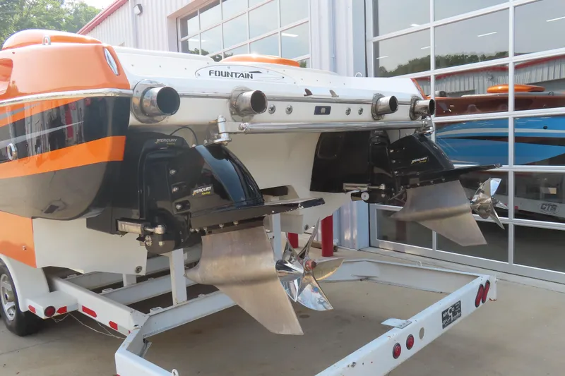 Slide: The Image of Rear view of an MTI 42 boat, 2003 model, with dual Mercury engines. - 3