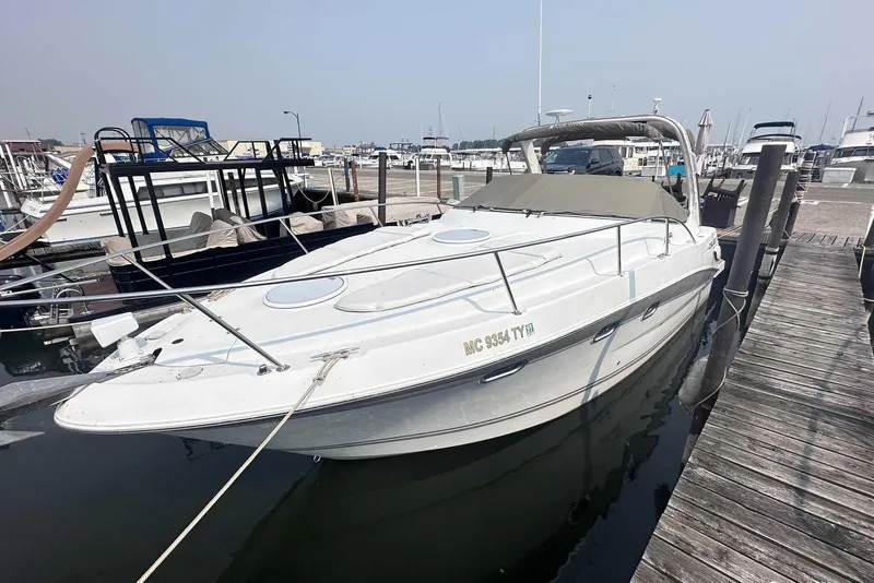 The Image of 2004 Four Winns 298 Vista boat docked at marina, side view. - 0