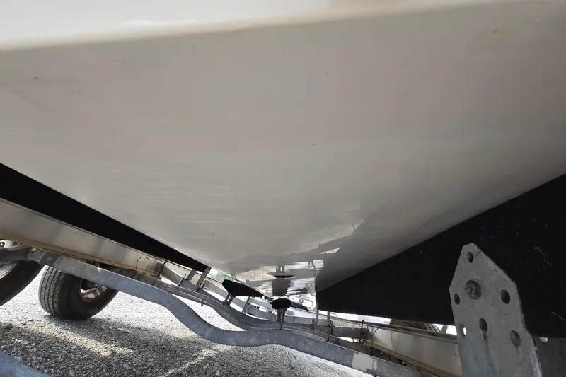 Slide: The Image of 2001 Chaparral Sunesta 233 boat hull on trailer, underside view. - 11