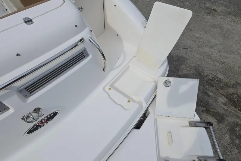 Slide: The Image of 2001 Chaparral Sunesta 233 boat deck with swim platform and ladder. - 14