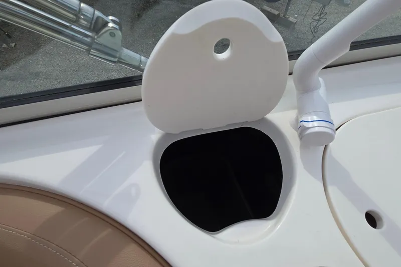 Slide: The Image of 2001 Chaparral Sunesta 233 boat cup holder and faucet detail. - 32