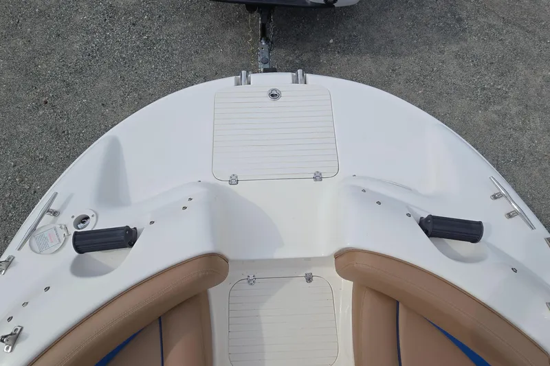 Slide: The Image of 2001 Chaparral Sunesta 233 boat bow with seating and storage compartments. - 36