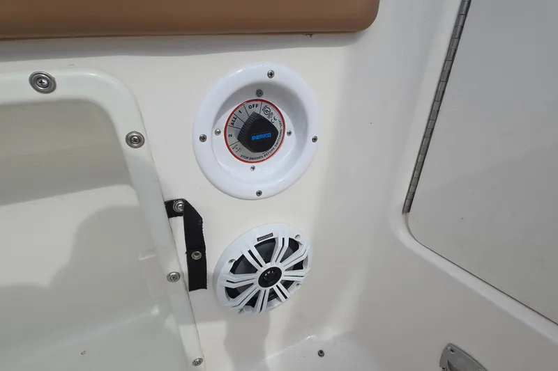 Slide: The Image of 2001 Chaparral Sunesta 233 boat interior with control panel and speaker. - 40