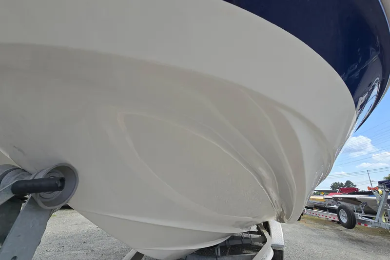 Slide: The Image of 2001 Chaparral Sunesta 233 boat hull on trailer, close-up view. - 9