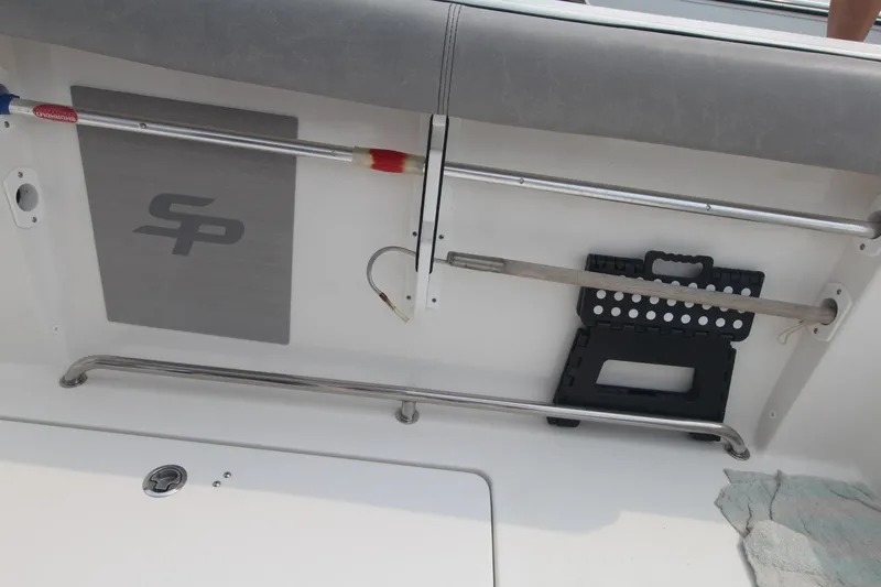 Slide: The Image of 2020 Sea Pro 259 Center Console boat interior with storage and equipment. - 13