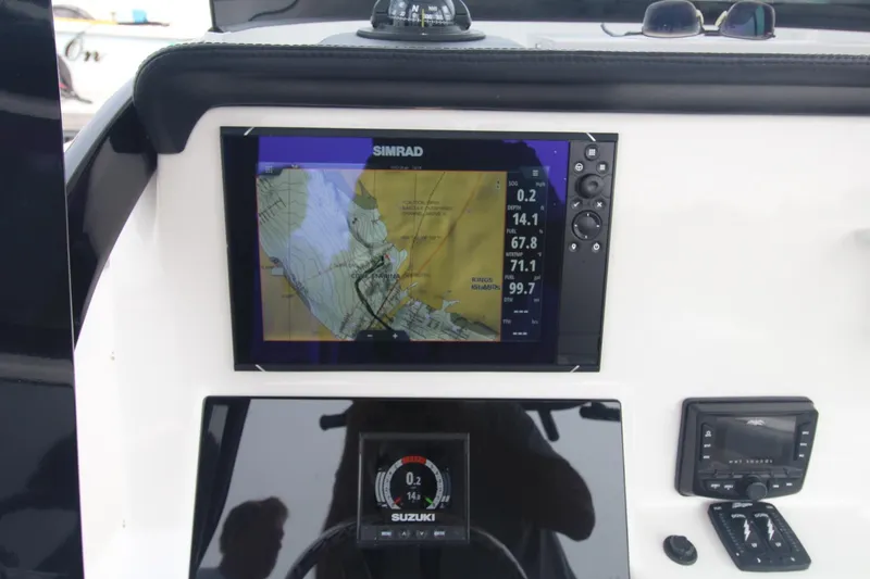 Slide: The Image of Simrad navigation display on 2020 Sea Pro 259 Center Console boat dashboard. - 36