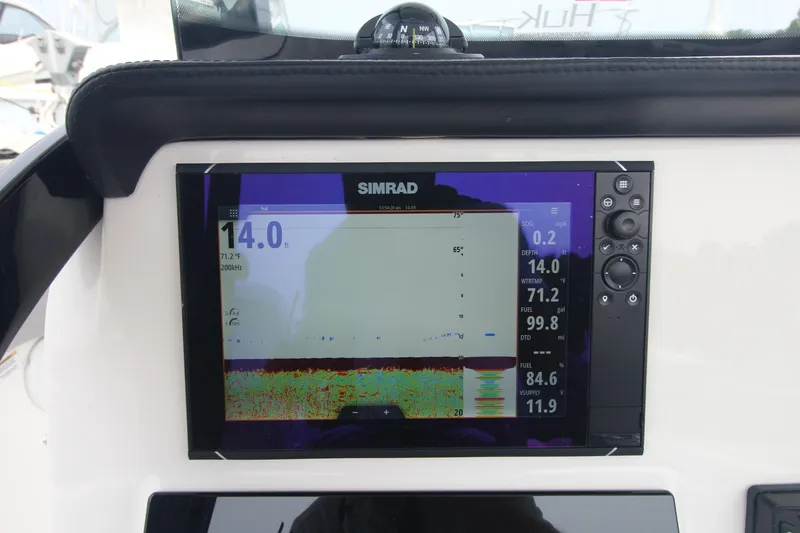 Slide: The Image of Simrad display on 2020 Sea Pro 259 Center Console boat dashboard. - 37