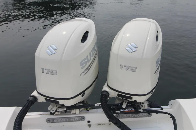 Slide: The Image of Twin Suzuki 175 outboard engines on a 2020 Sea Pro 259 Center Console boat. - 39