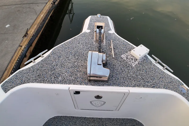 Slide: The Image of Bow of 2004 Century 2900 Center Console with anchor winch and chain. - 15