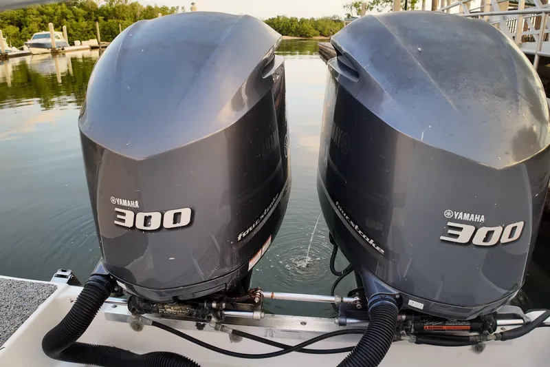 Slide: The Image of Twin Yamaha 300 outboard engines on a 2004 Century 2900 Center Console boat. - 16
