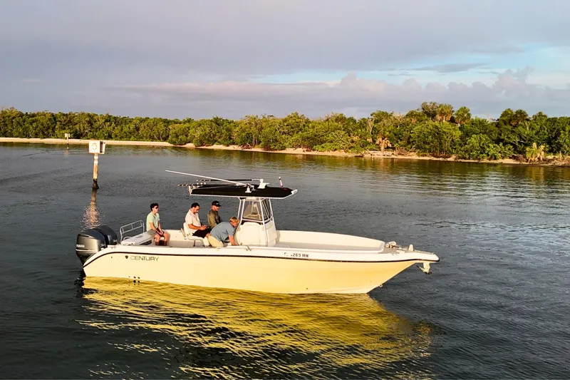 Slide: The Image of Aerial view of a 2004 Century 2900 Center Console boat on calm water. - 3