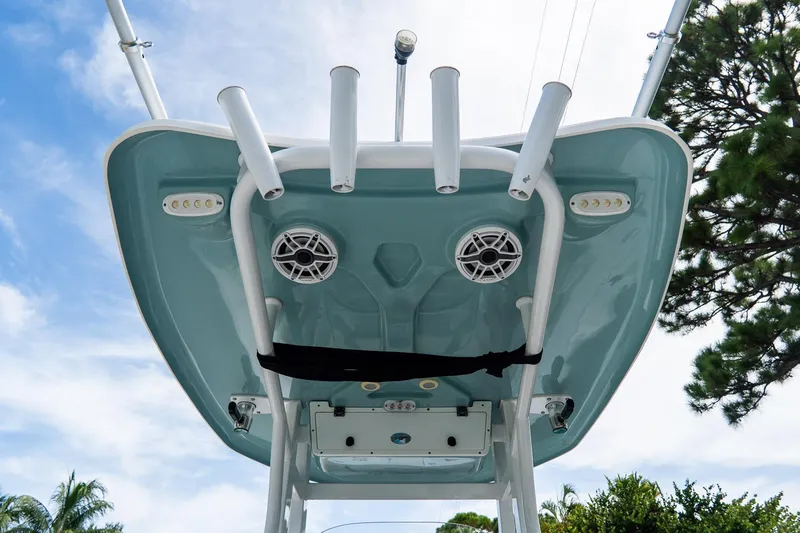 Slide: The Image of 2020 Tidewater 272 CC Adventure boat top view with rod holders and speakers. - 26