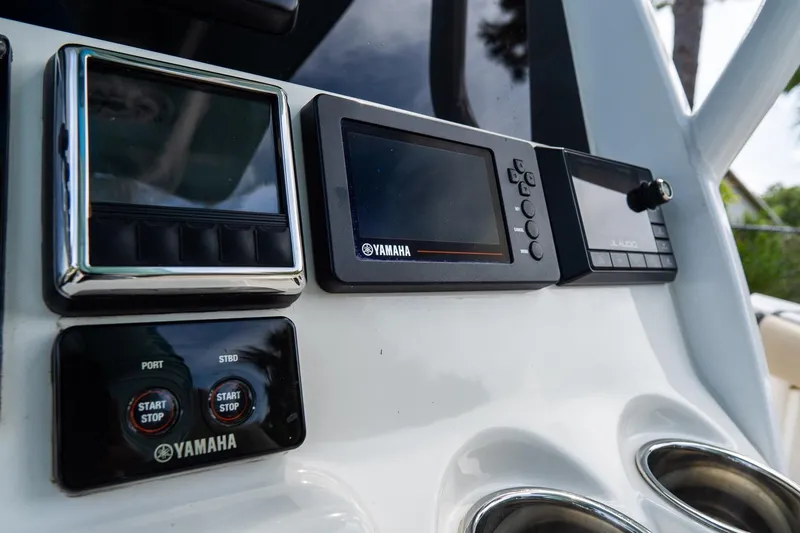 Slide: The Image of Control panel of 2020 Tidewater 272 CC Adventure boat with Yamaha displays. - 36