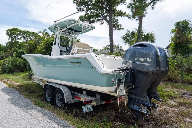 Slide: The Image of 2020 Tidewater 272 CC Adventure boat with Yamaha engines on a trailer. - 4