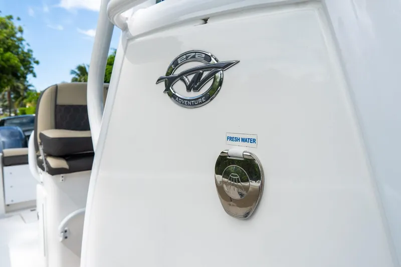 Slide: The Image of 2020 Tidewater 272 CC Adventure boat with fresh water access feature. - 50
