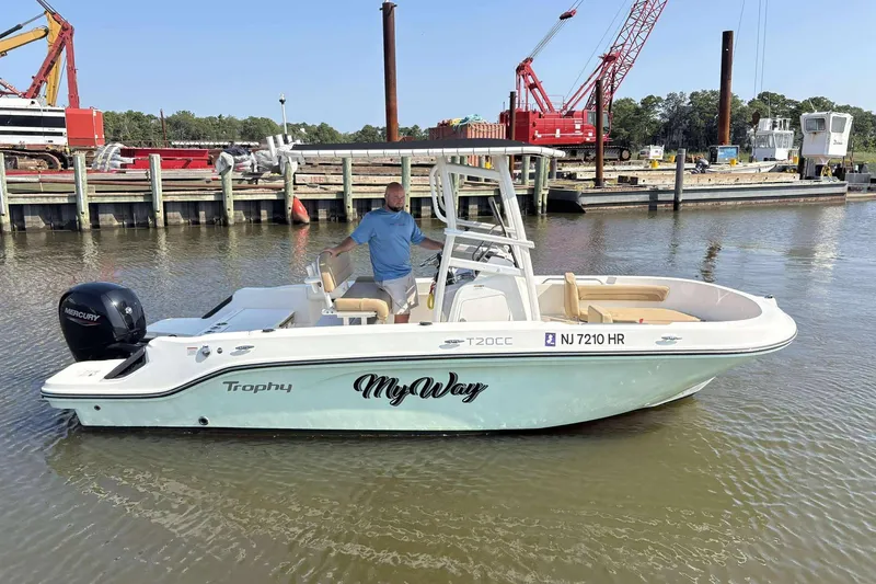 Slide: The Image of 2022 Bayliner Trophy T20CC boat named "My Way" docked in a marina. - 5