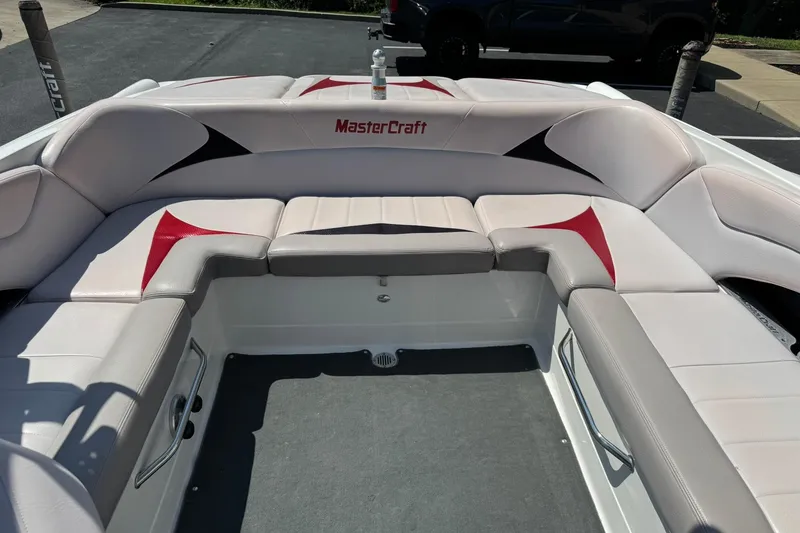 Slide: The Image of 2007 MasterCraft X15 boat interior with white and red seating. - 12