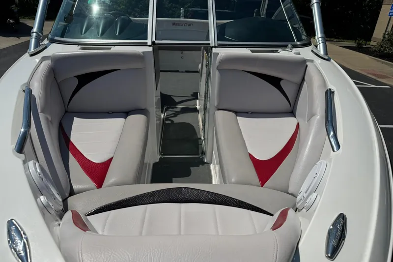 Slide: The Image of 2007 MasterCraft X15 boat interior with white and red seating. - 8
