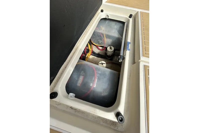 Slide: The Image of Engine compartment of a 2008 Mainship Pilot 34 boat, showing wiring and components. - 17