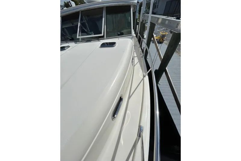 Slide: The Image of 2008 Mainship Pilot 34 boat deck with cloudy sky background. - 29