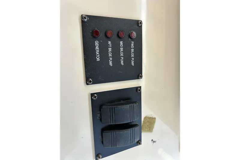 Slide: The Image of Control panel with dual joysticks for Mainship Pilot 34, 2008 model. - 64