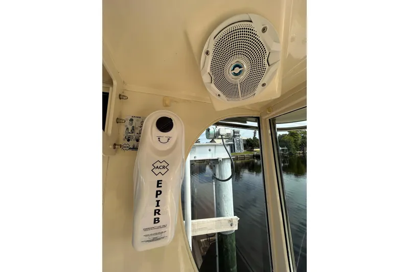 Slide: The Image of 2008 Mainship Pilot 34 interior with speaker, bell, and clock. - 85