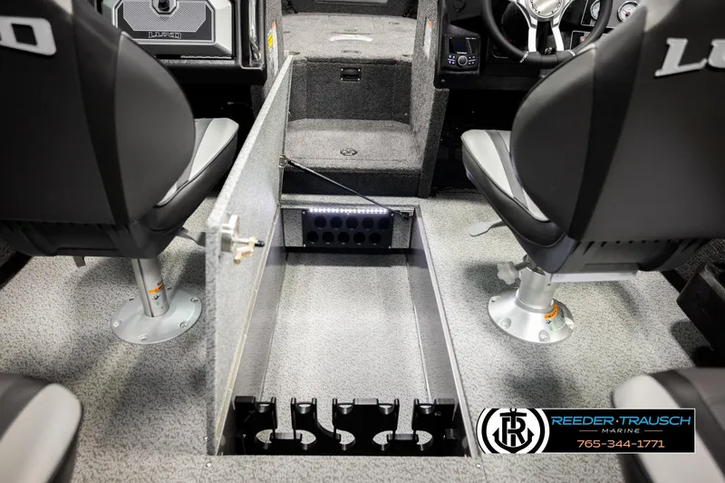 Slide: The Image of 2026 Lund 1875 Tyee boat interior with open storage compartment and seating. - 30