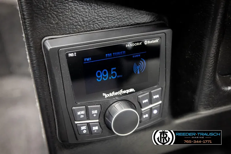 Slide: The Image of Rockford Fosgate PMX-2 stereo system in 2026 Lund 1875 Tyee boat, displaying FM tuner. - 35