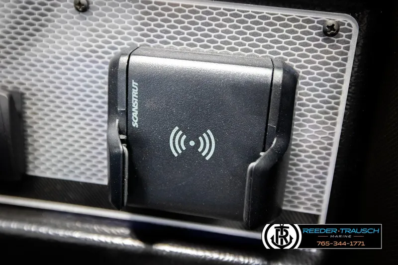 Slide: The Image of Close-up of a Scanstrut wireless charging mount on a 2026 Lund 1875 Tyee boat. - 39