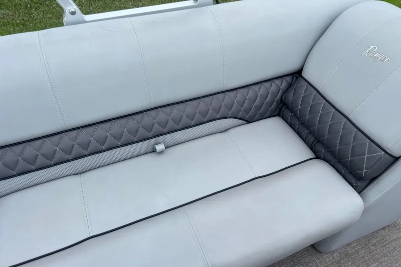 Slide: The Image of 2019 Ranger Reata 200C boat seat with gray quilted upholstery and elegant stitching. - 10