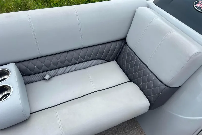 Slide: The Image of 2019 Ranger Reata 200C boat seat with quilted gray upholstery and cup holders. - 18