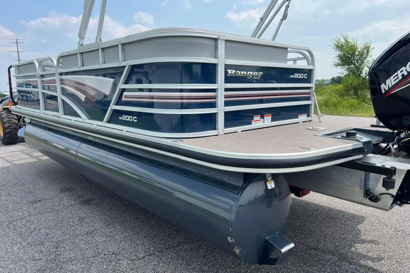 Slide: The Image of 2019 Ranger Reata 200C pontoon boat with Mercury outboard engine on a sunny day. - 4
