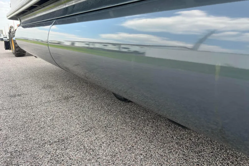 Slide: The Image of 2019 Ranger Reata 200C pontoon boat reflecting on pavement. - 53