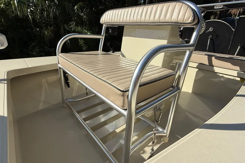 Slide: The Image of 2020 East Cape EVO X 18 boat seat with stainless steel frame and beige upholstery. - 17