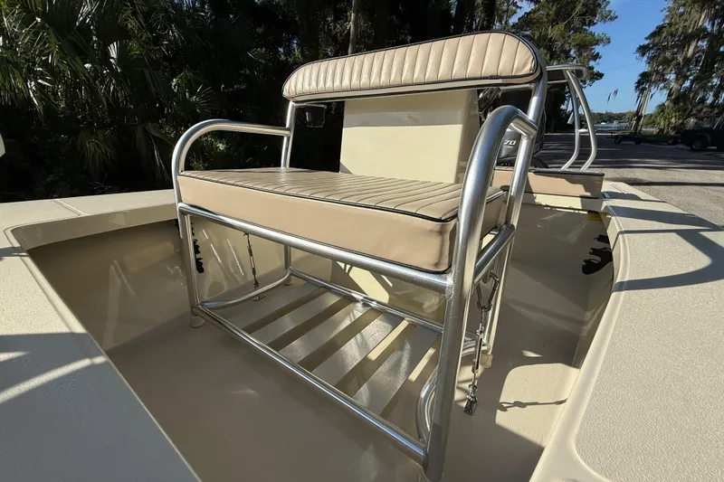 Slide: The Image of 2020 East Cape EVO X 18 boat with cushioned seating and stainless steel frame. - 19