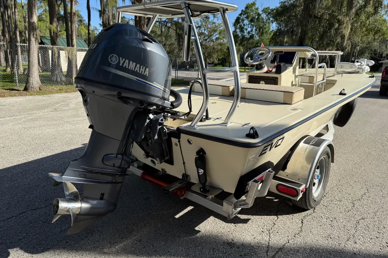 Slide: The Image of 2020 East Cape EVO X 18 boat with Yamaha outboard motor on a trailer. - 24