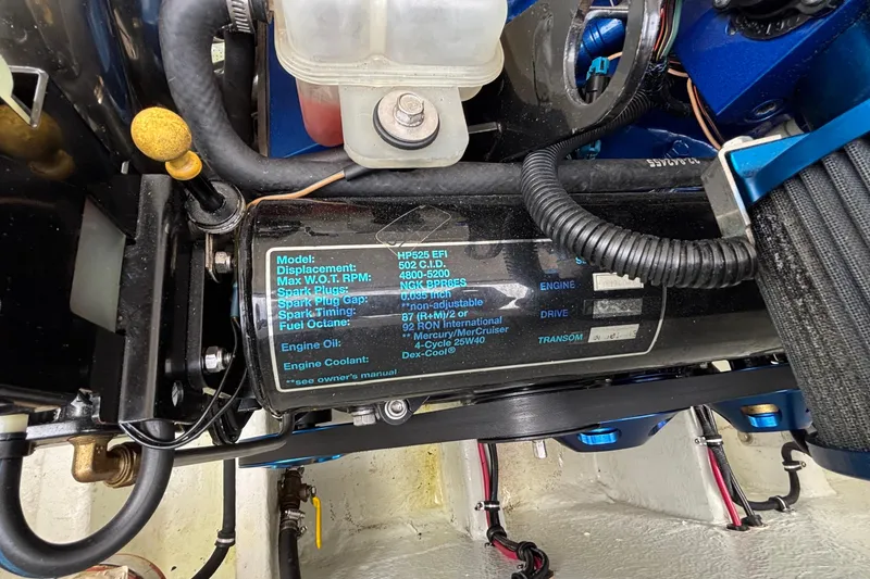Slide: The Image of Engine specifications label on a 2003 Fountain 29 Fever boat. - 30
