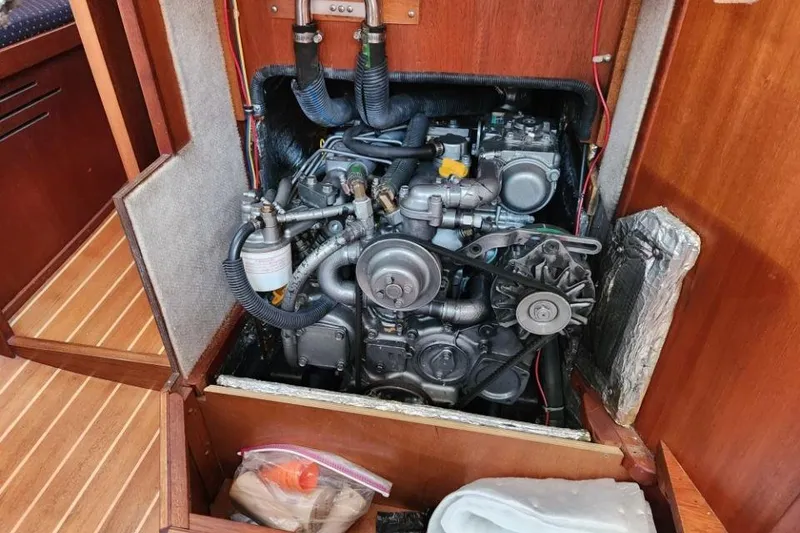Slide: The Image of Engine compartment of a 2002 Sabre 362 sailboat, showcasing detailed mechanical components. - 10