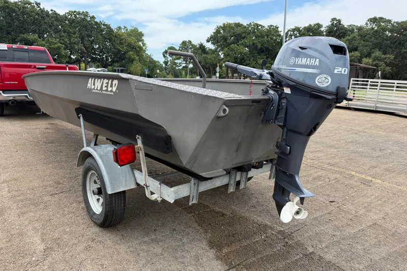 Slide: The Image of 2021 Alweld 1852 Invader boat on trailer with Yamaha 20 outboard motor. - 12
