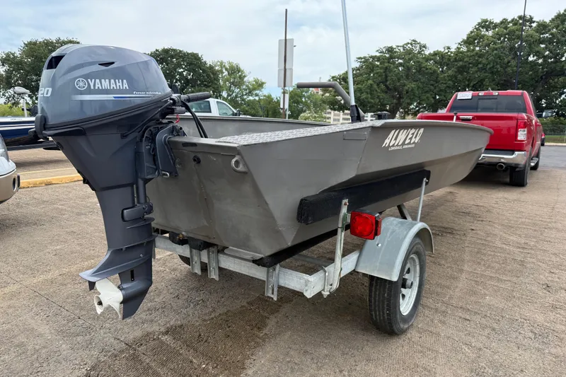Slide: The Image of 2021 Alweld 1852 Invader boat with Yamaha motor on trailer. - 15