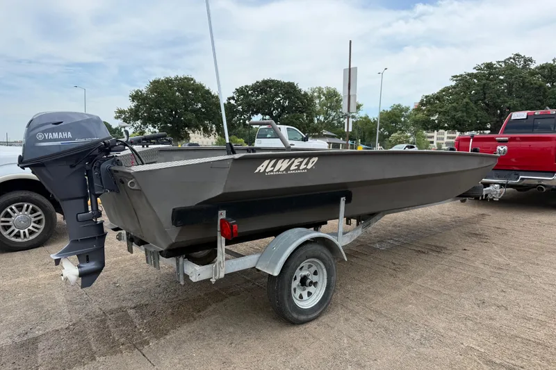 Slide: The Image of 2021 Alweld 1852 Invader boat on trailer with Yamaha outboard motor. - 16