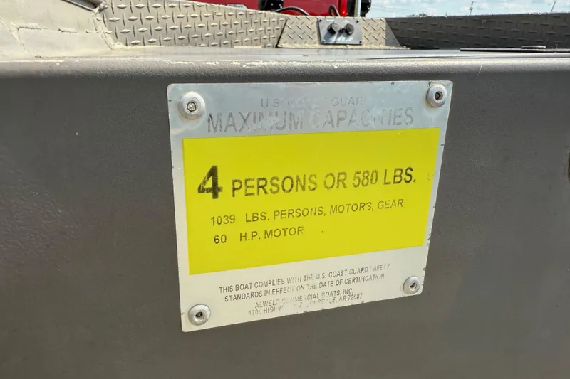 Slide: The Image of 2021 Alweld 1852 Invader boat capacity label, 4 persons or 580 lbs limit. - 33