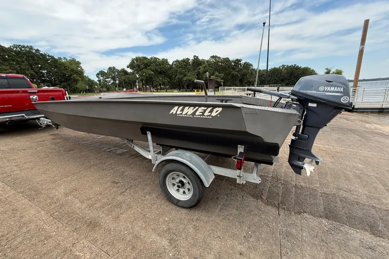 Slide: The Image of 2021 Alweld 1852 Invader boat on trailer with Yamaha outboard motor. - 6