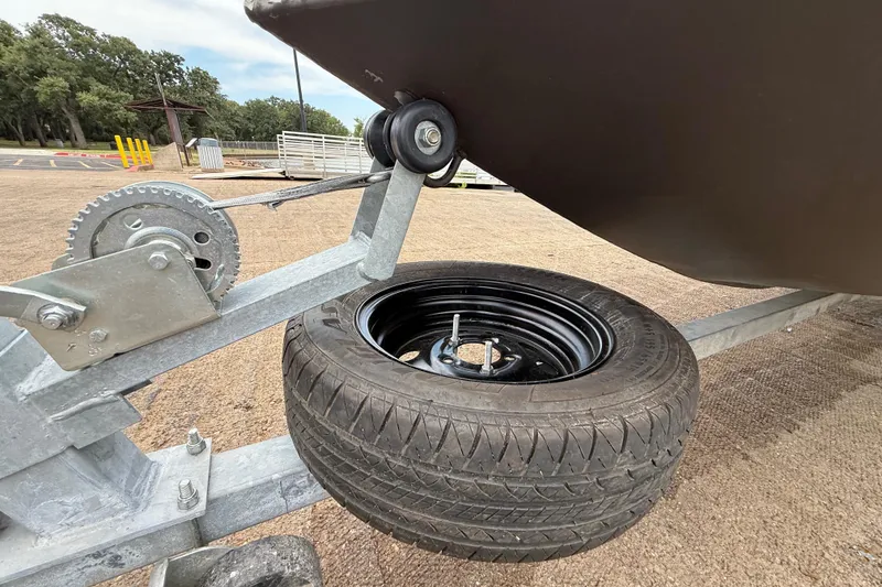 Slide: The Image of Trailer wheel and winch mechanism of 2021 Alweld 1852 Invader boat. - 9