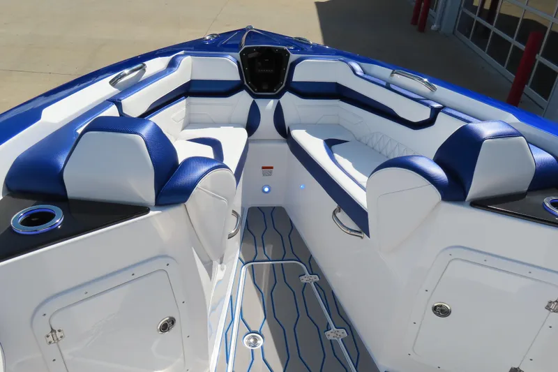 Slide: The Image of 2026 Sunsation 32CCX boat interior with blue and white seating and modern design. - 17