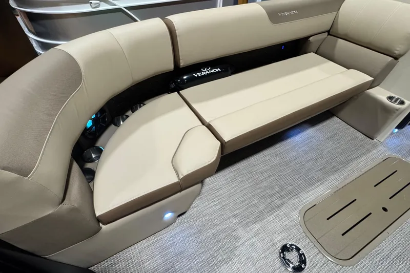 Slide: The Image of 2026 Veranda Relax VR265L boat interior with beige seating and LED lighting. - 4