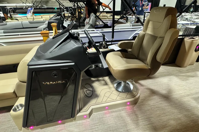 Slide: The Image of 2026 Veranda Relax VR265L boat interior with luxurious captain's chair and control panel. - 6