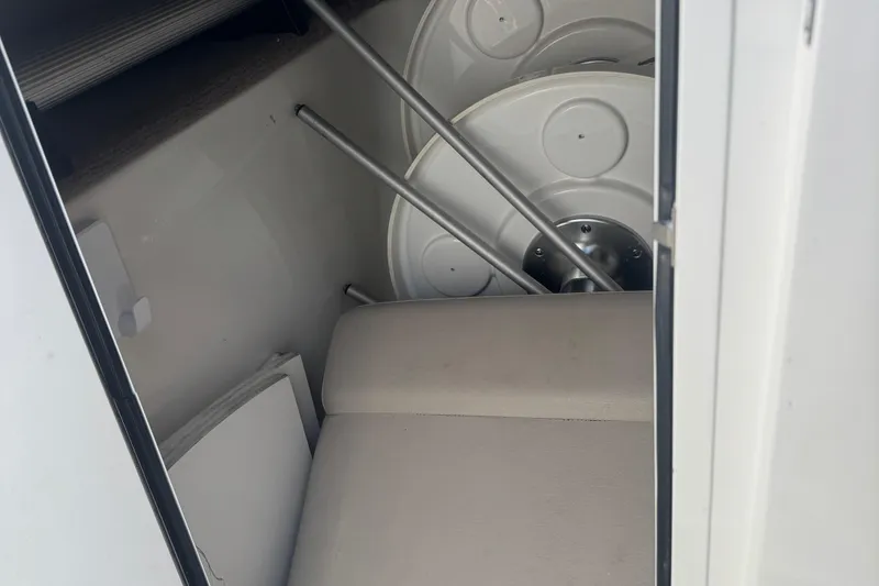Slide: The Image of Interior storage compartment of a 2011 Sea Ray 270 SLX boat. - 13